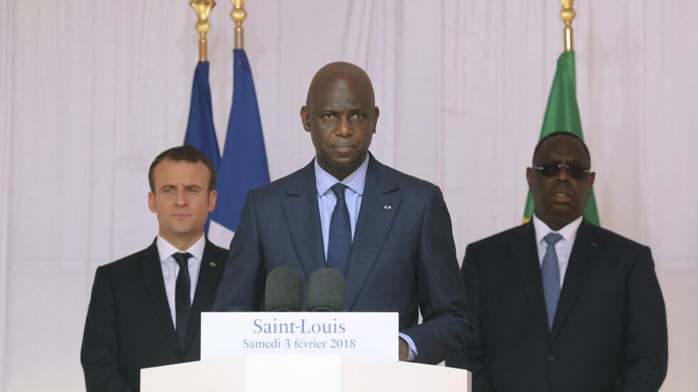 Saint-Louis Mayor Amadou Mansour Faye with French President Emmanuel Macron and former Senegalese President Macky Sall on 3 Febuary 2018, in Saint Louis, Senegal. 
