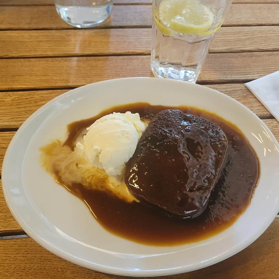 A plate of food and ice cream

AI-generated content may be incorrect.