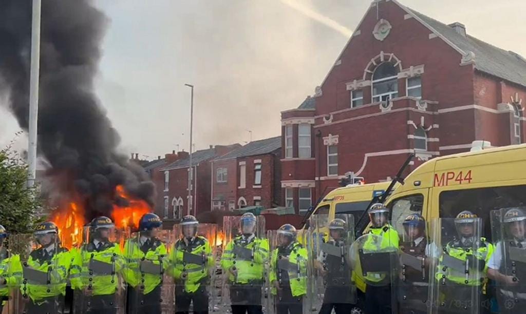 Southport stabbing latest: Clashes in Southport after town mourns in vigil  for victims of stabbing attack - BBC News