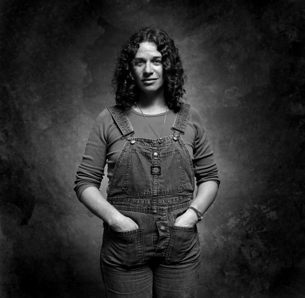 Carole King stands in Jim McGuire's studio.