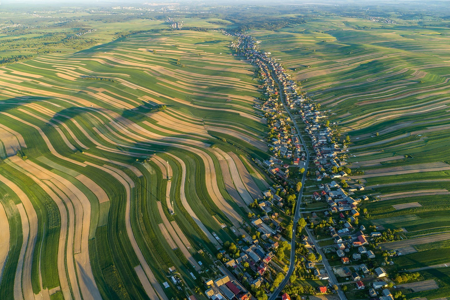 The imprint of history is visible in the division of Polish farmland around the village of Suloszowa. © George Steinmetz The imprint of history is visible in the division of Polish farmland around the village of Suloszowa. © George Steinmetz