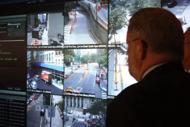 NYPD Deputy Commissioner, Public Information Paul Browne watches the screens of the Domain Awareness System in Lower Manhattan