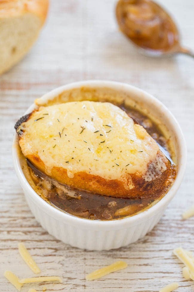Easy One-Hour French Onion Soup - Learn how to make the classic soup in 1 hour and it's EASY! Full of rich, savory flavor and topped with French bread and melted cheese that's IRRESISTIBLE!! Easy One-Hour French Onion Soup - Learn how to make the classic soup in 1 hour and it's EASY! Full of rich, savory flavor and topped with French bread and melted cheese that's IRRESISTIBLE!!
