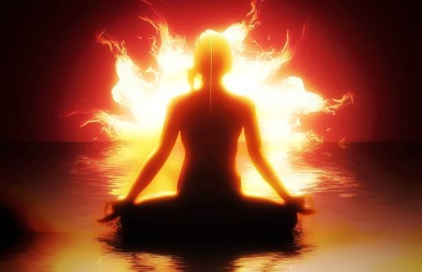 3D illustration of a woman burning energy and meditating 3D illustration of a woman burning energy and meditating fire meditation stock pictures, royalty-free photos & images