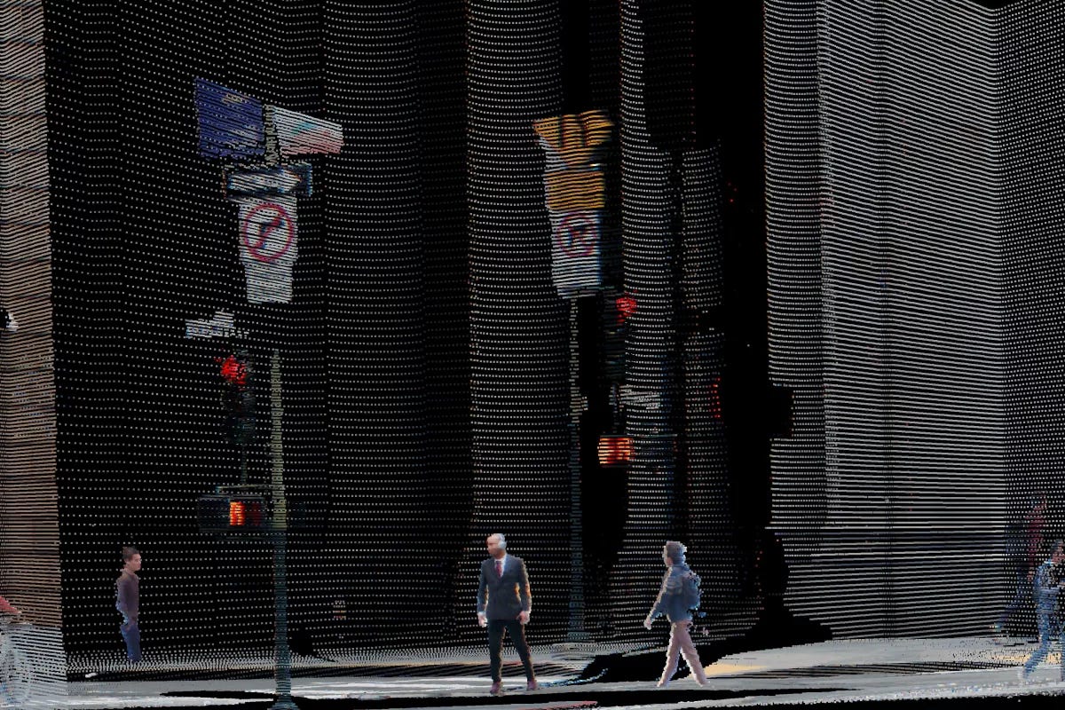 A city block as Rev8 sees it: pedestrians, traffic signals, and building facades rendered in a fully colored 3D point cloud A city block as Rev8 sees it: pedestrians, traffic signals, and building facades rendered in a fully colored 3D point cloud