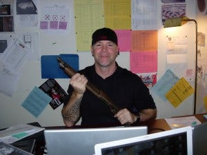 Prop master Chris Cooper shows off one of Jensen's favorite props