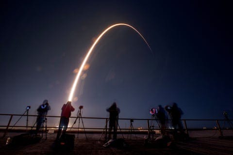people photograph a rocket launch people photograph a rocket launch