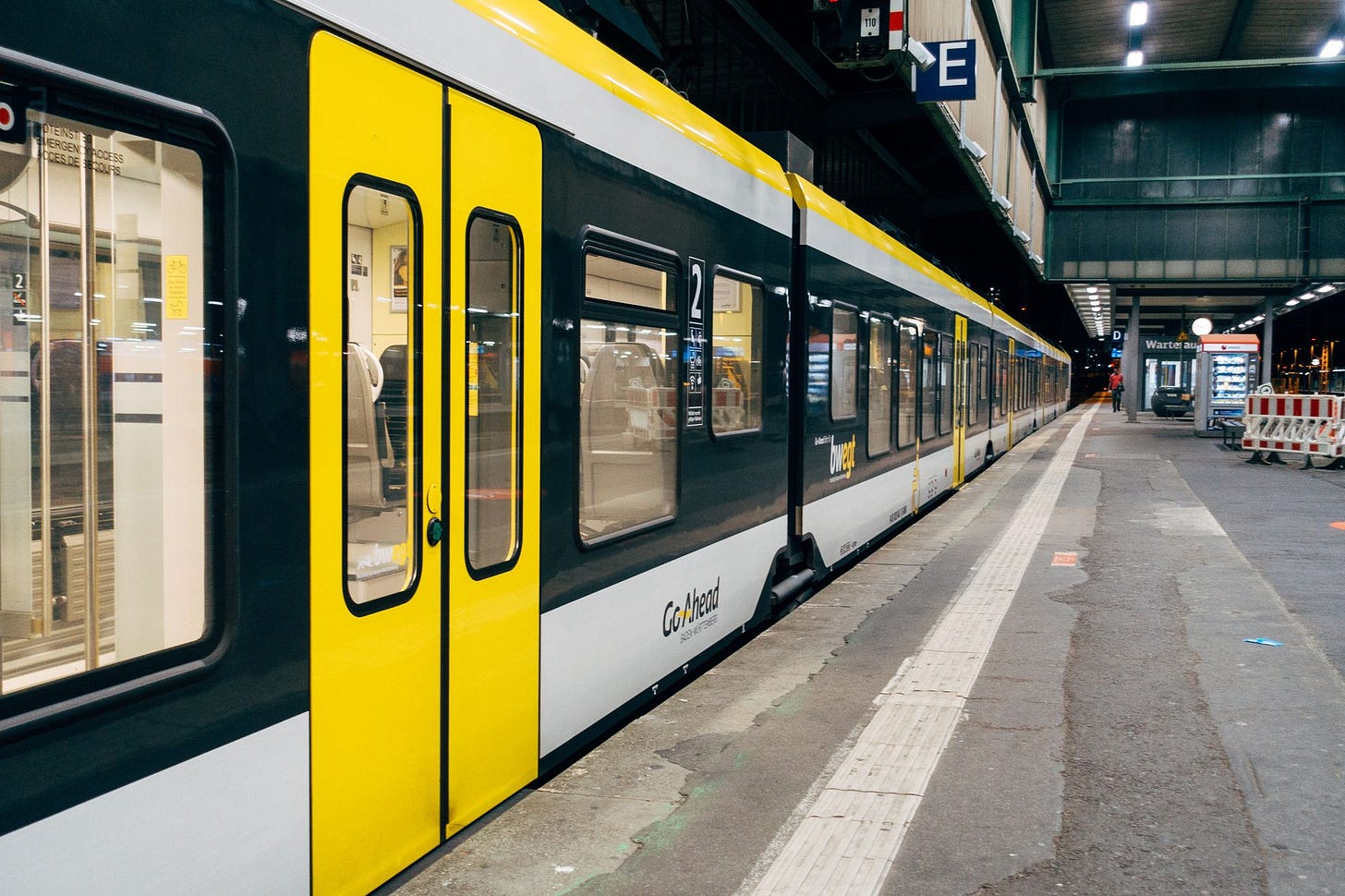 photo of a metro with green doors