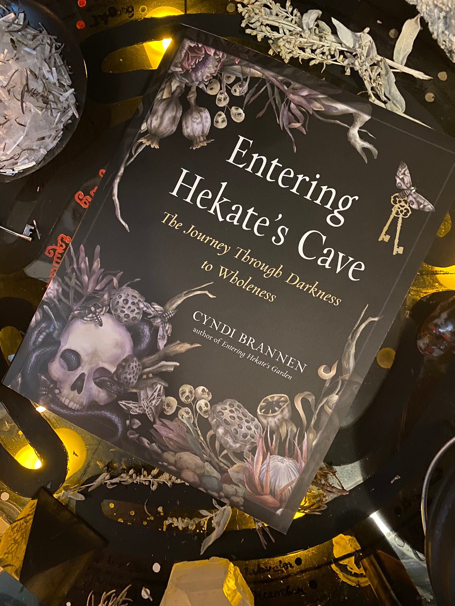 Entering Hekate’s Cave: The Journey Through Darkness to Wholeness by Cyndi Brannen explores shadow work through epithets of Hekate - including Propylaia, Chthonia, Enodia and Psychopomp - with practices and rituals. Entering Hekate’s Cave: The Journey Through Darkness to Wholeness by Cyndi Brannen explores shadow work through epithets of Hekate - including Propylaia, Chthonia, Enodia and Psychopomp - with practices and rituals.