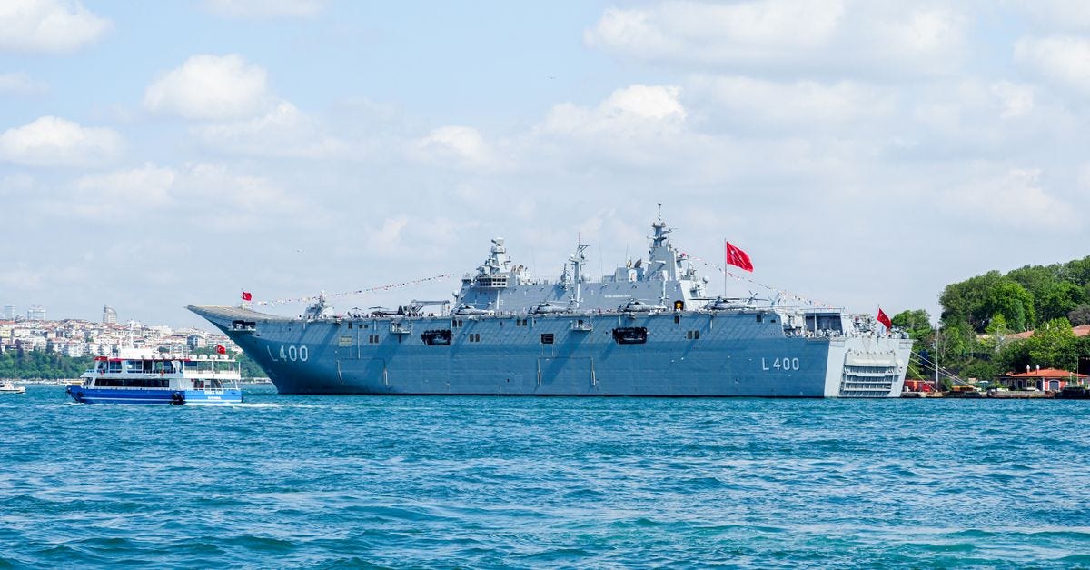 Photo: Rasul Yarichev / Pexels Turkish naval warship L400 in the Bosphorus, Istanbul, navigating the strait on a sunny day.