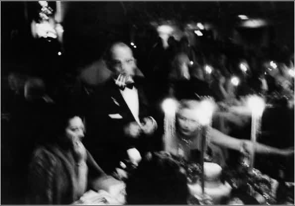William Klein, Elsa Maxwell's Toy Ball at the Waldorf, New York (3  Cigarettes), 1955 | Peter Fetterman Gallery