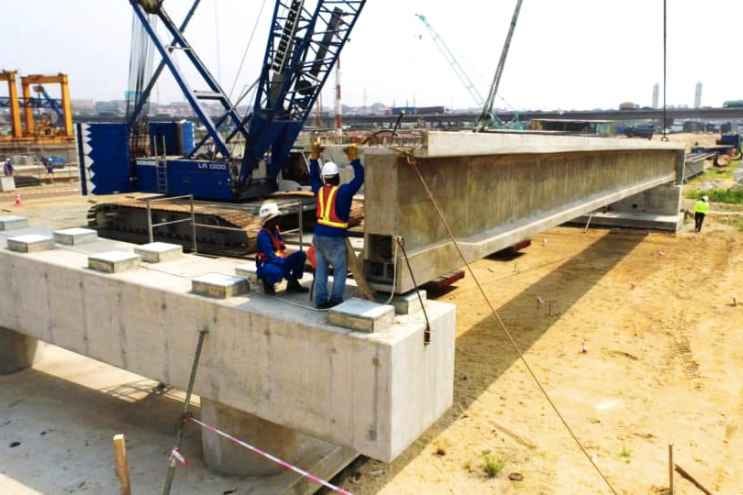 This photo shows the launch of the First Beam over the Opebi-Mende Link Bridge traversing Opebi to link Ojota. Credit: LASG. This photo shows the launch of the First Beam over the Opebi-Mende Link Bridge traversing Opebi to link Ojota. Credit: LASG.