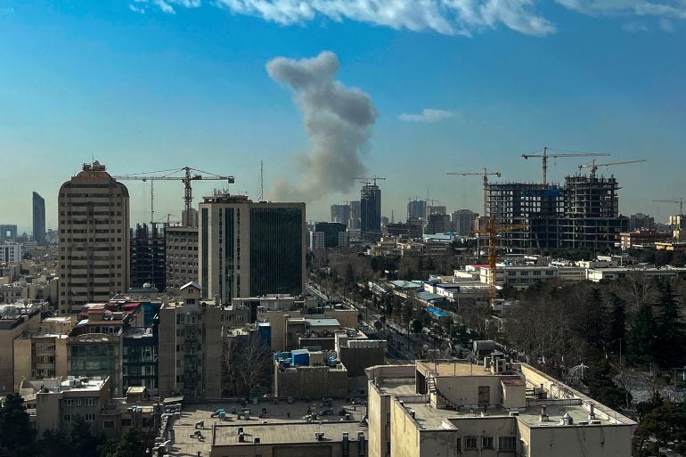 TOPSHOT - A plume of smoke rises following a reported explosion in Tehran on February 28, 2026. TOPSHOT - A plume of smoke rises following a reported explosion in Tehran on February 28, 2026.