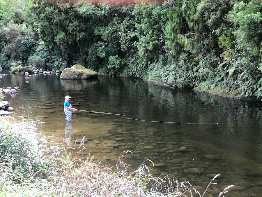 Man fly-fishing New Zealand
