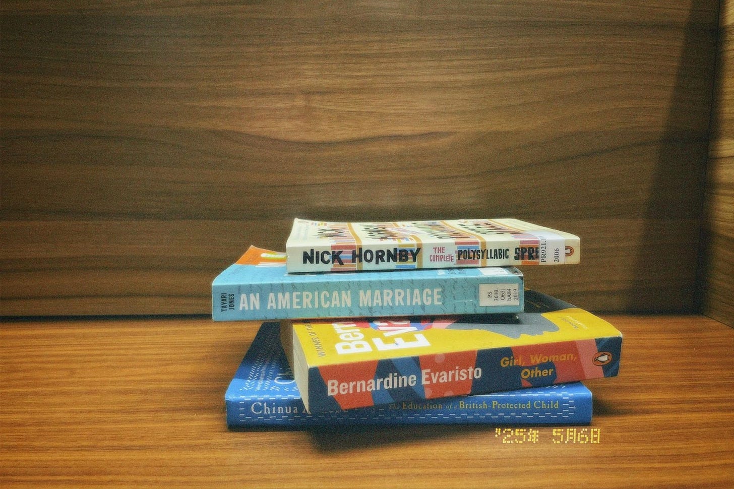 A stack of four books