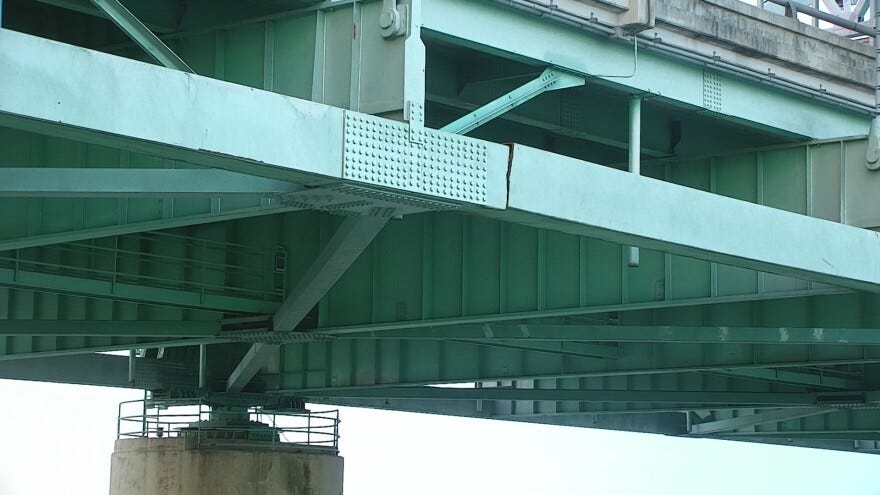 The damaged section of the Interstate 40 bridge over the Mississippi River linking Arkansas and Tennessee. The Arkansas Department of Transportation called it a "significant fracture" that warranted shutting down the span until it's repaired.
