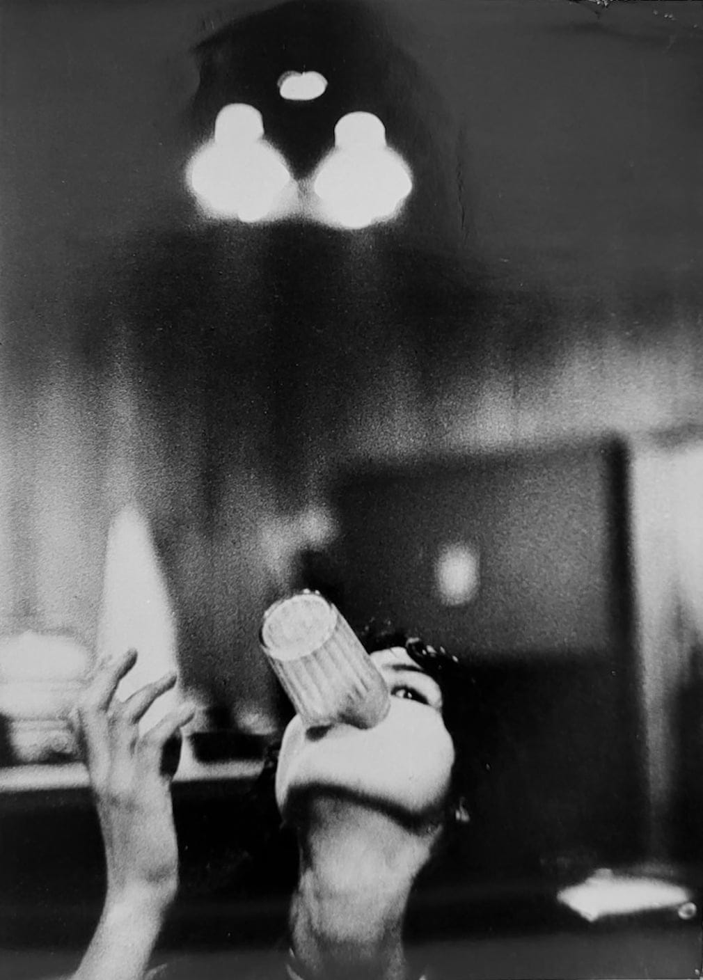 Nancy Playing With a Glass, New York, 1958(The Beat Generation series) by Louis Stettner