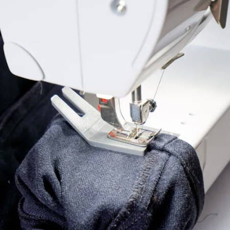 using a bulky seam jumper to sew over a seam on a sewing machine
