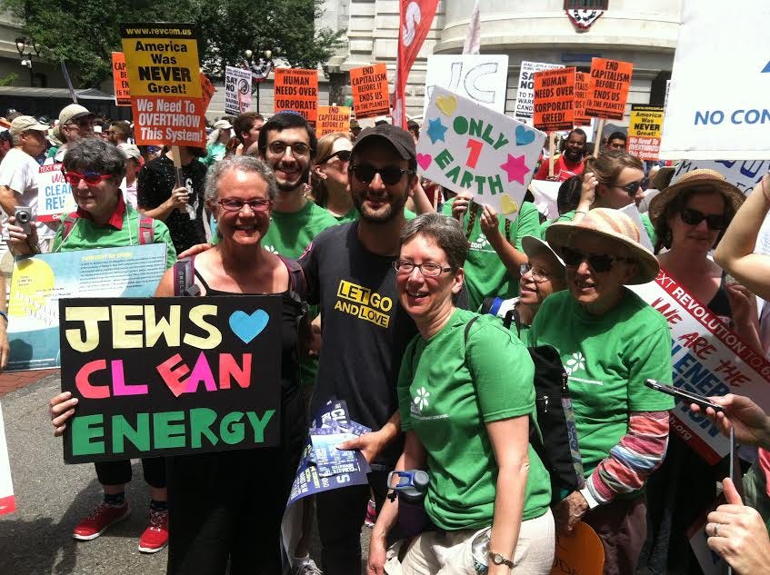 Mirele Goldsmith, front center, participates with JCAN-NYC activists at the March for Clean Energy in Philadelphia in 2016. To her left is Josh Fox (in sunglasses), producer and director of ‘Gasland,’ a movie about fracking. (Courtesy/ Michael Brochstein) Mirele Goldsmith, front center, participates with JCAN-NYC activists at the March for Clean Energy in Philadelphia in 2016. To her left is Josh Fox (in sunglasses), producer and director of ‘Gasland,’ a movie about fracking. (Courtesy/ Michael Brochstein)