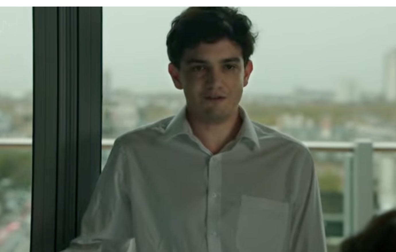 A person standing in front of a window

AI-generated content may be incorrect.