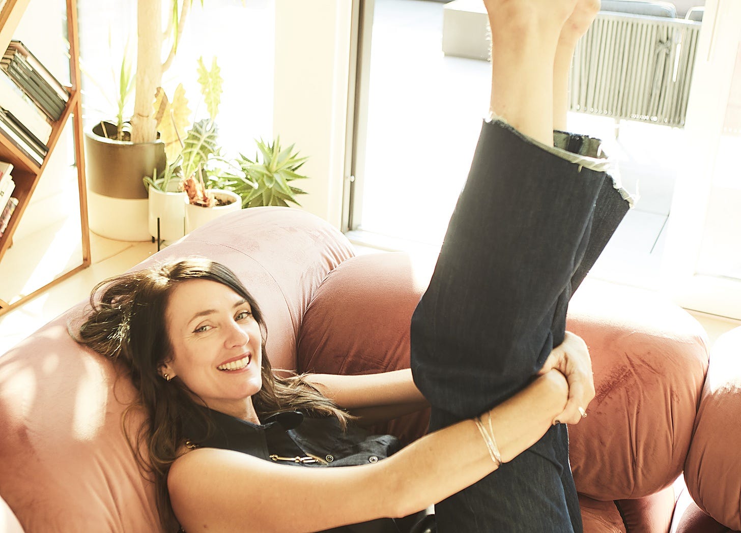 Natasha Silva-Jelly, founder of The New Front Row, on Substack laughing on a pink velvet sofa with her legs up in a sunlit New York apartment. Natasha Silva-Jelly, founder of The New Front Row, on Substack laughing on a pink velvet sofa with her legs up in a sunlit New York apartment.