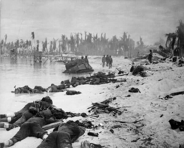 A beach with palm trees in the distance. Debris and dead bodies litter the shore.