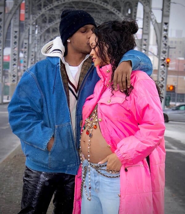 Rihanna and ASAP Rocky were photographed strolling along a Harlem street in the snow.
