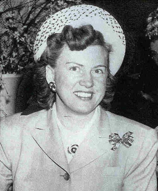 A person wearing a hat and jacket

Description automatically generated