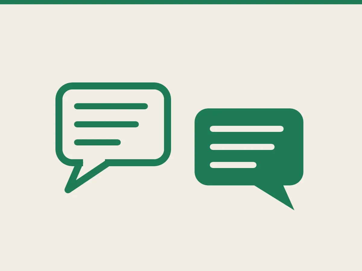 Two speech bubbles side by side, one outlined, one filled Two speech bubbles side by side, one outlined, one filled