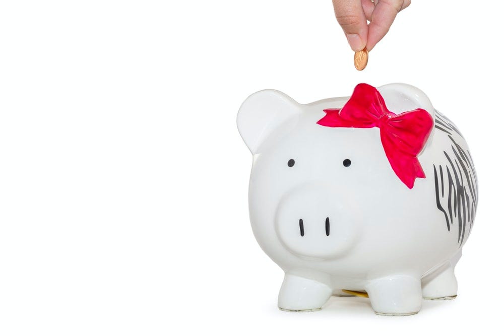 white ceramic piggy bank
