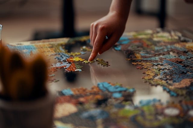 A jigsaw being completed.