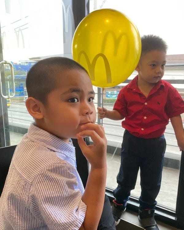 Miguel and Rafa in their first Christmas party at McDonald's Belfast Miguel and Rafa in their first Christmas party at McDonald's Belfast