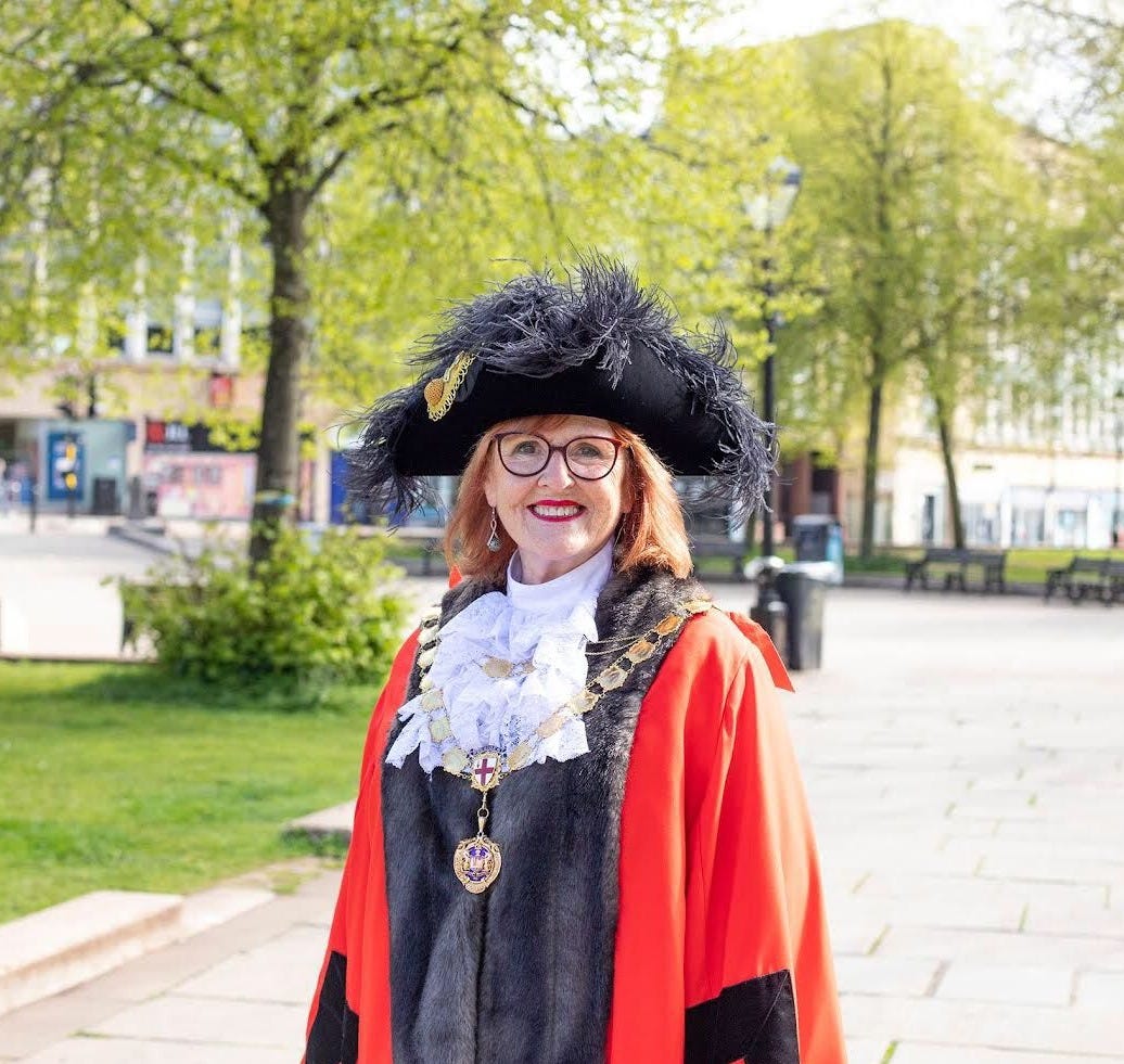 Former Bristol Lord Mayor Paula O'Rourke in ceremonial robes and tricorn hat, standing in Bristol city centre. She resigned from the Green Party group after watching councillors walk out during public meetings.