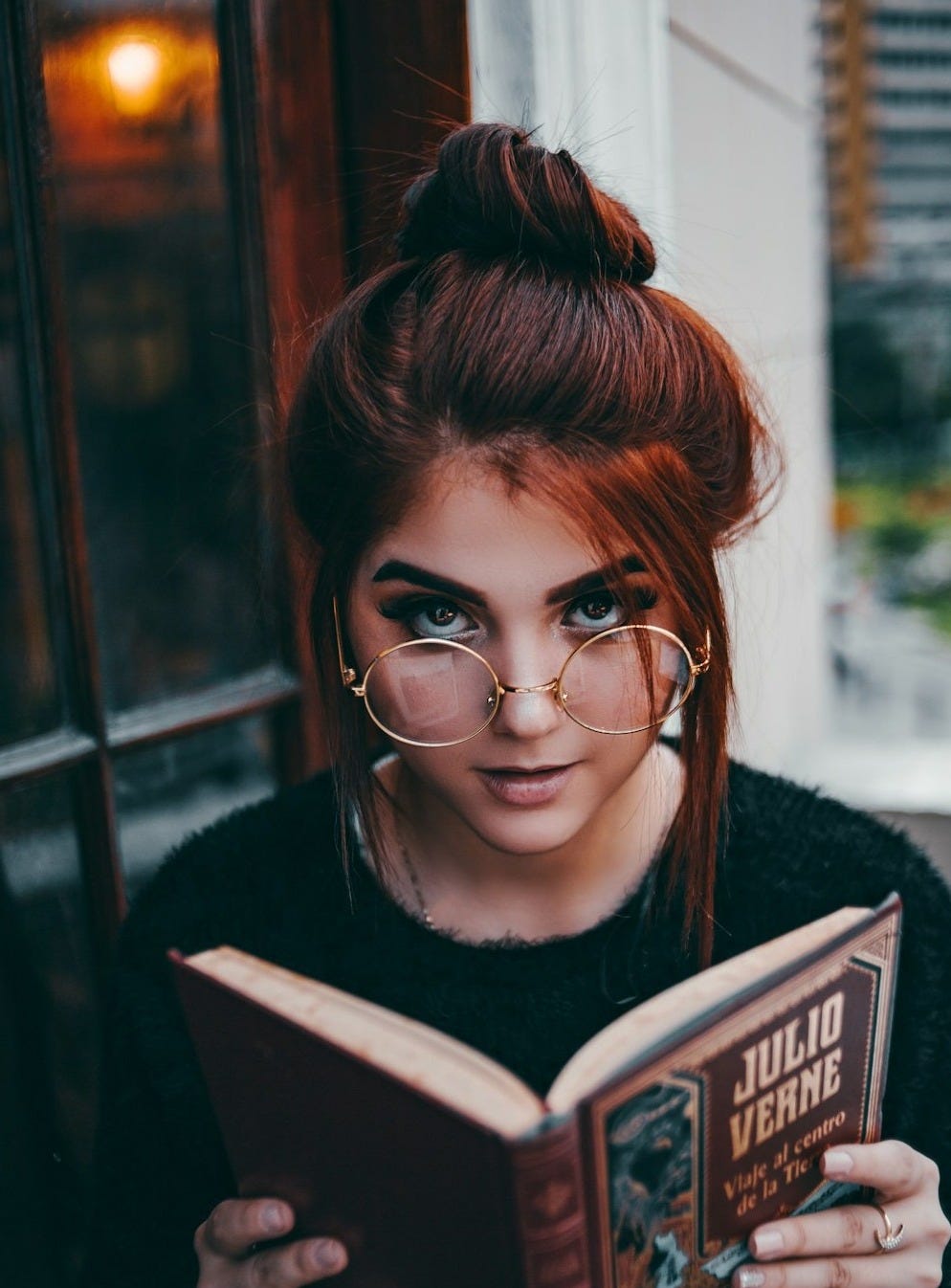 woman holding book