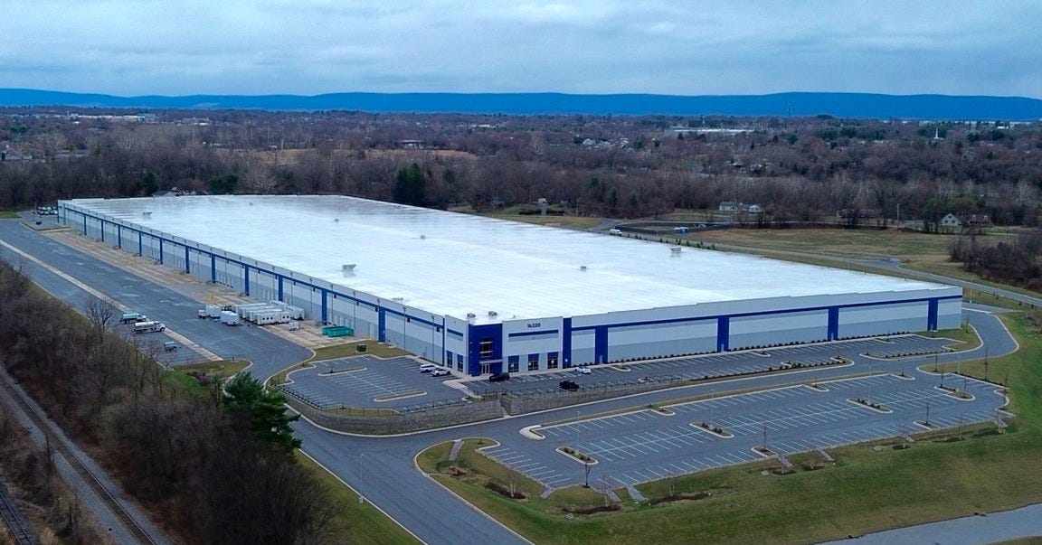 Restroom trailers and water tankers sit at the back of the U.S. Immigration and Customs Enforcement facility at 16220 Wright Road in Williamsport, Md. 