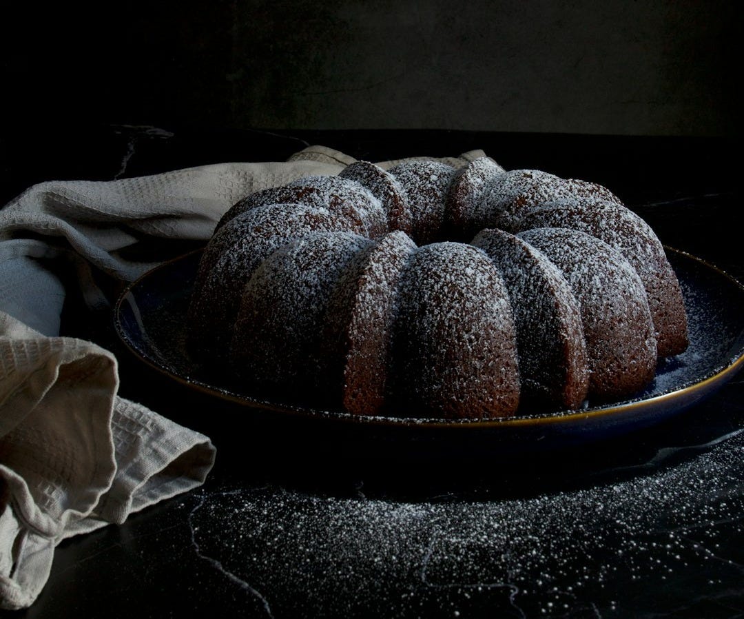 a bundt cake sitting on top of a blue plate