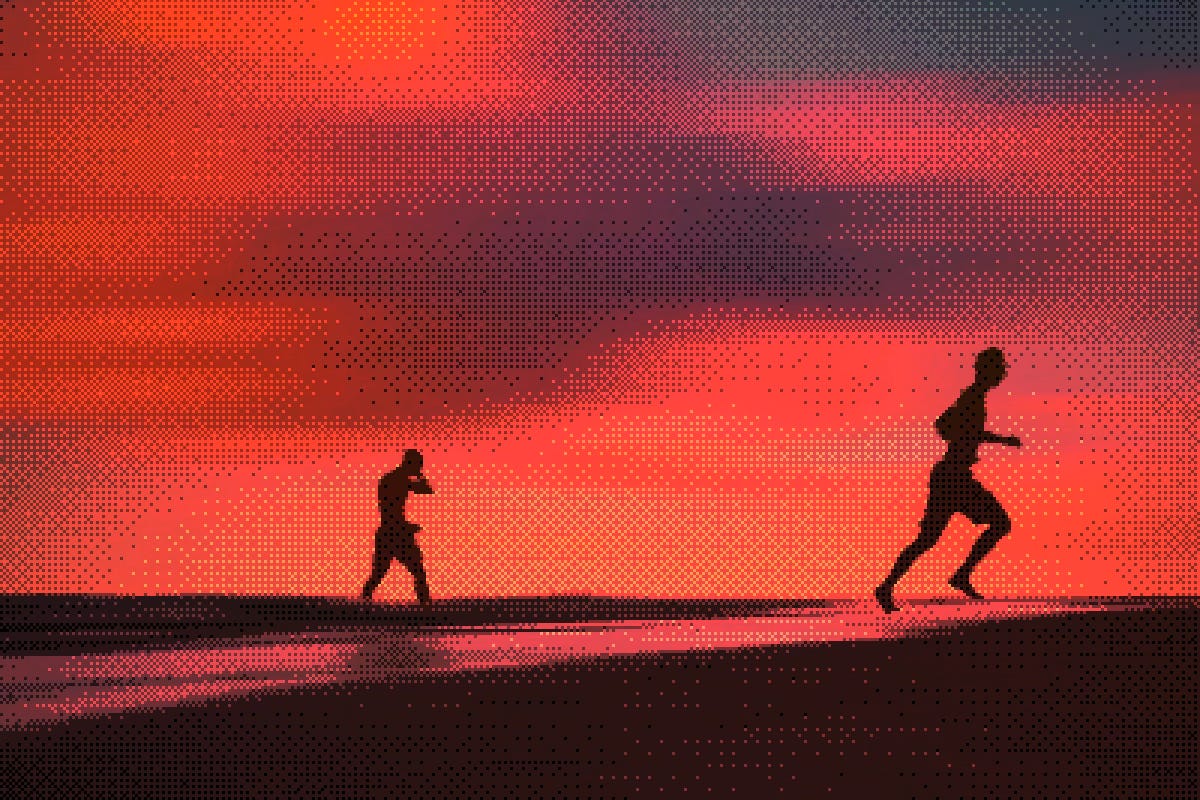 Two men running at the beach during sunset Two men running at the beach during sunset