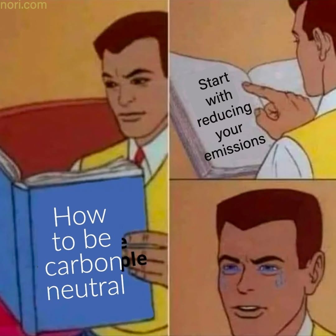 Cartoon of a man reading a blue book titled "How to be carbon neutral". The page reads "Start with reducing your emissions". In the last panel he is crying.