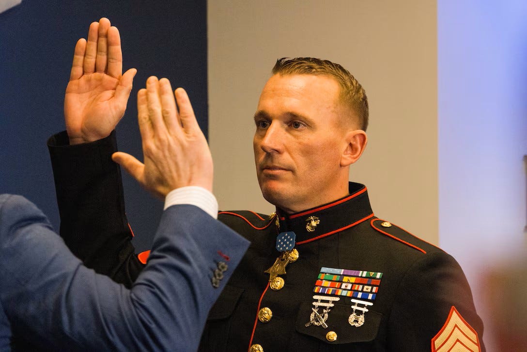 A Hero in Reserve: Dakota Meyer, Medal of Honor Marine, reenlists after 15 years. His return boosts recruitment and shows enduring service. A Hero in Reserve: Dakota Meyer, Medal of Honor Marine, reenlists after 15 years. His return boosts recruitment and shows enduring service.
