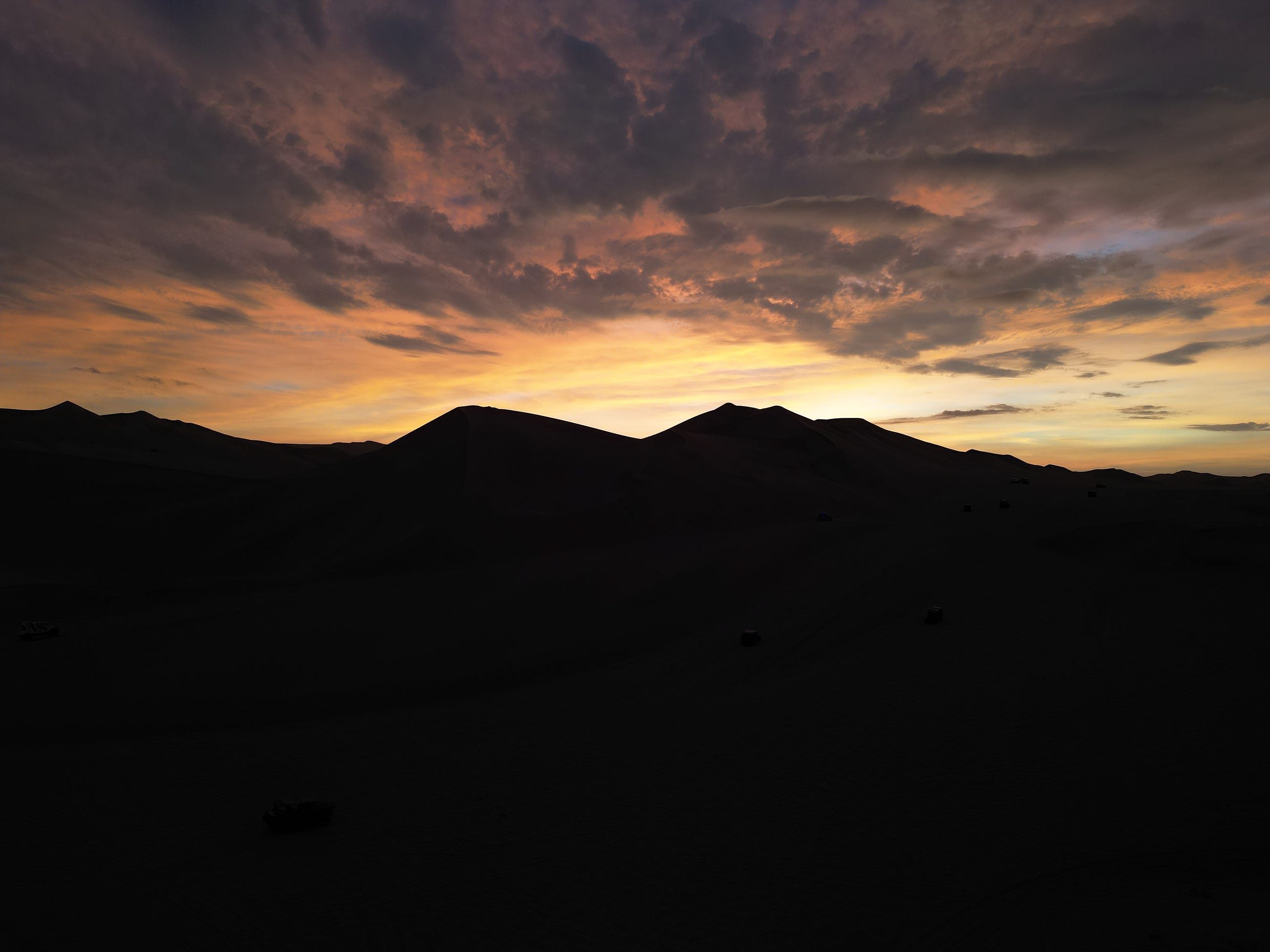 The final photo of sunset taken on drone before it crashlanded in the dunes of Huacachina, Peru The final photo of sunset taken on drone before it crashlanded in the dunes of Huacachina, Peru