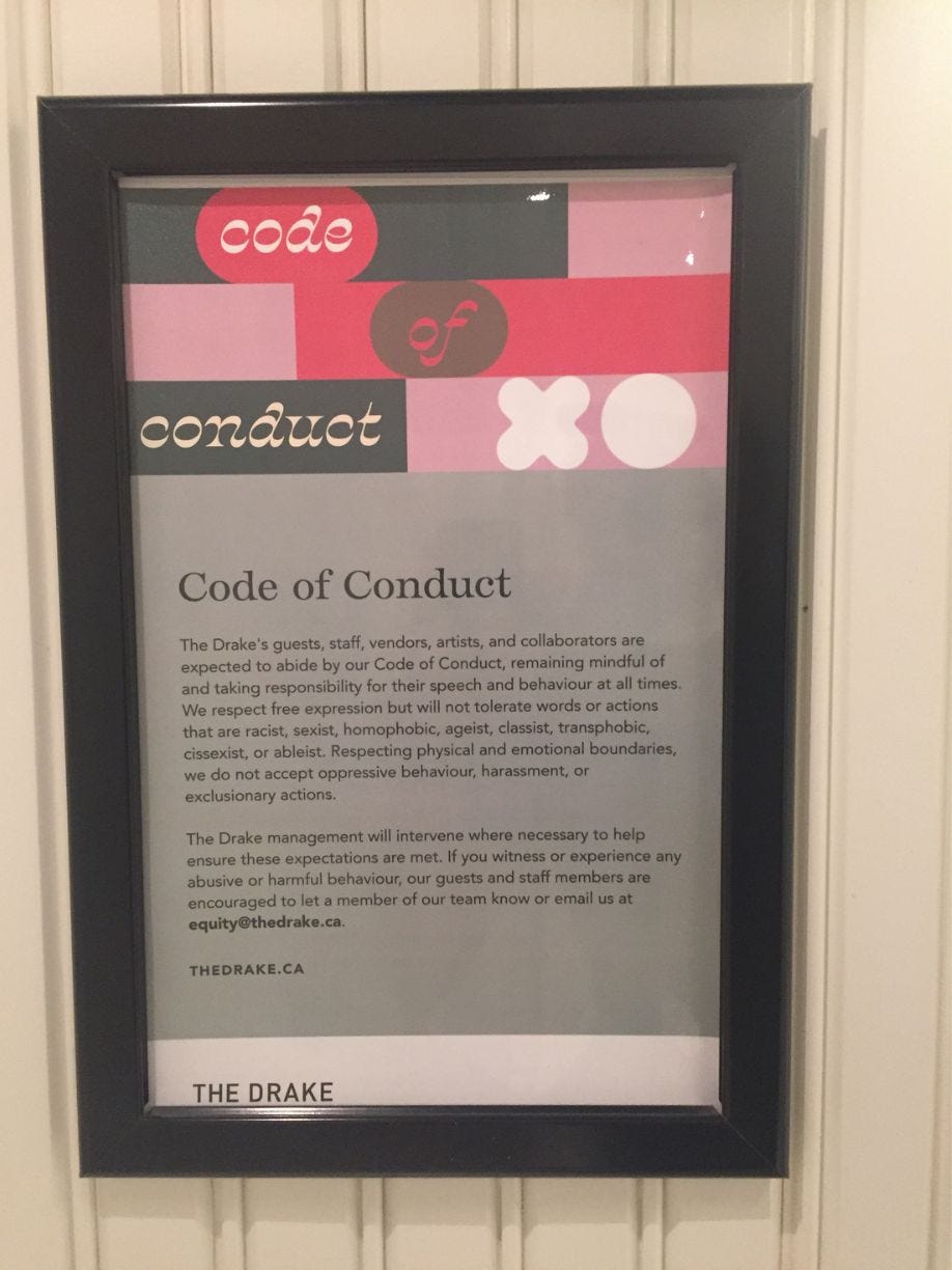 Image of a code of conduct taken at a restaurant bathroom Image of a code of conduct taken at a restaurant bathroom