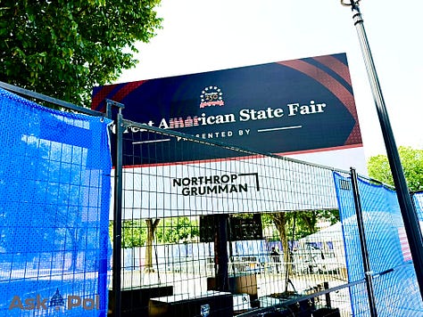 Signs from sponsors Northrop Grumman, GE Aerospace and Lockheed Martin at President Donald Trump's Freedom 250 State Fair on National Mall