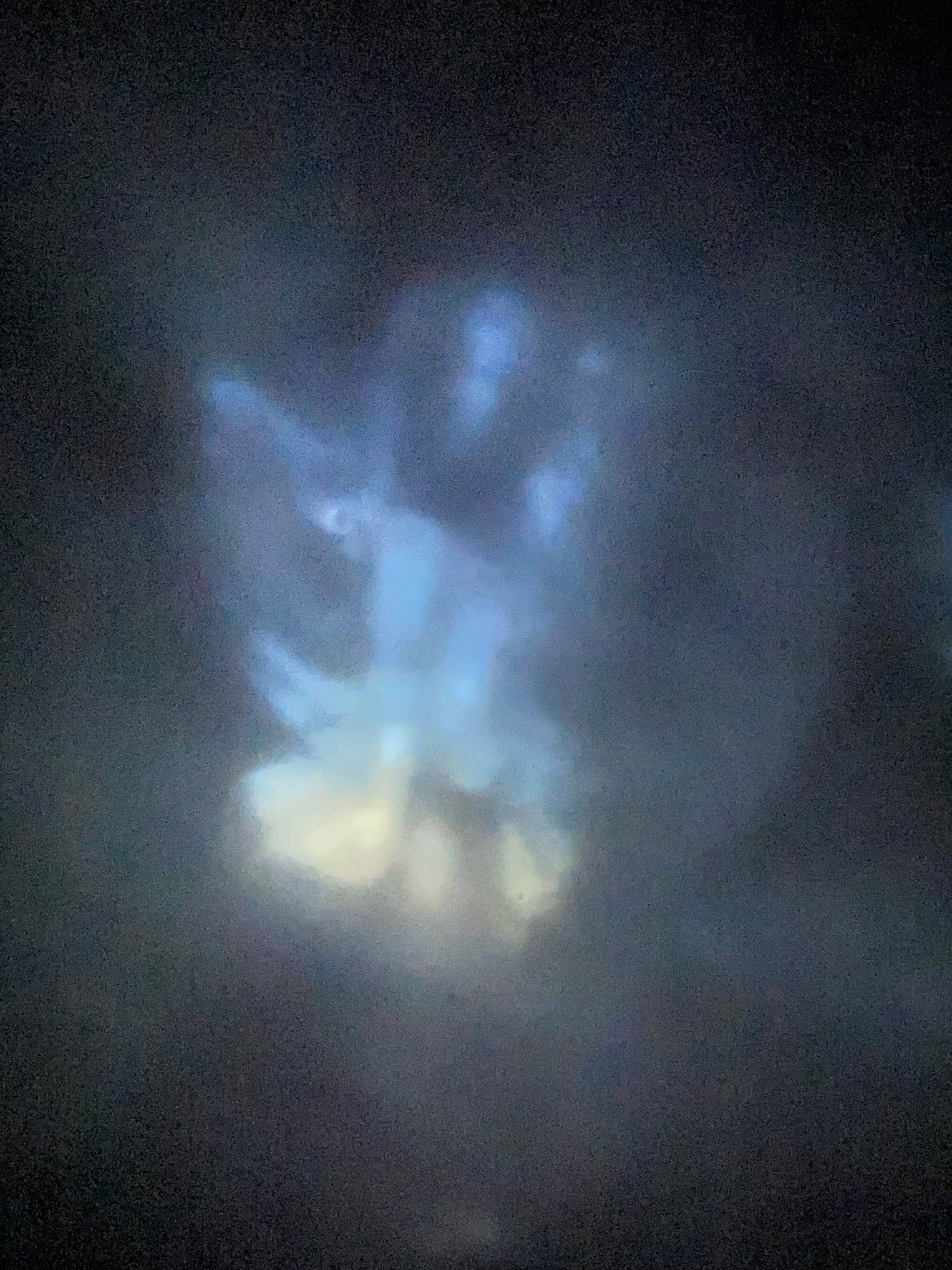 dark smudgy photo of the sky with some light coming through dark smudgy photo of the sky with some light coming through