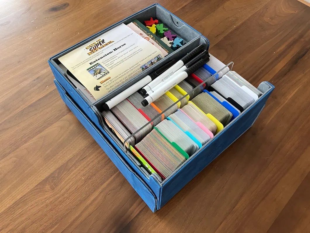 a bunch of small box games loaded into the games lair 600 convertible