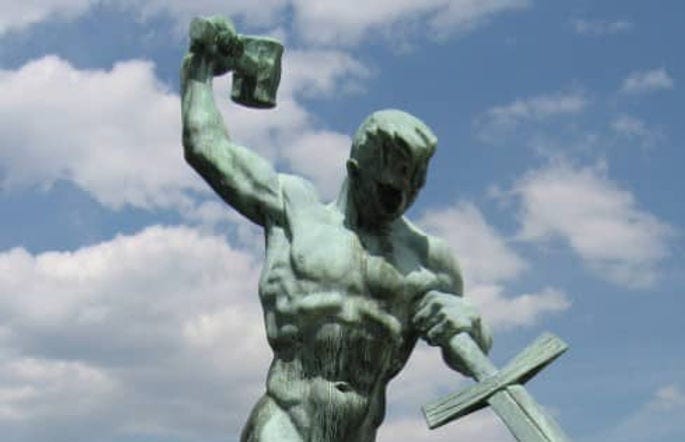 Let Us Beat Swords Into Ploughshares bronze sculpture by artist Evgeniy Vuchetich