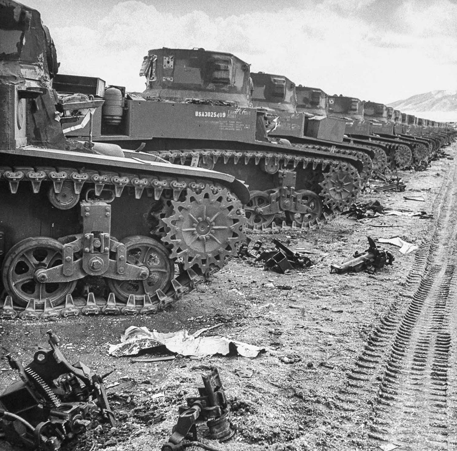 Rows of obsolete M3A1 Light tanks sit abandoned in a vast U.S. Army depot, 1946. Rows of obsolete M3A1 Light tanks sit abandoned in a vast U.S. Army depot, 1946.
