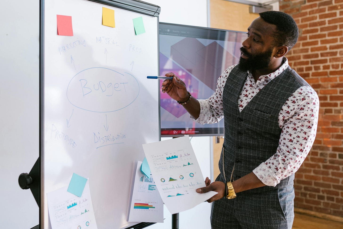 Bearded man presenting. Bearded man presenting.