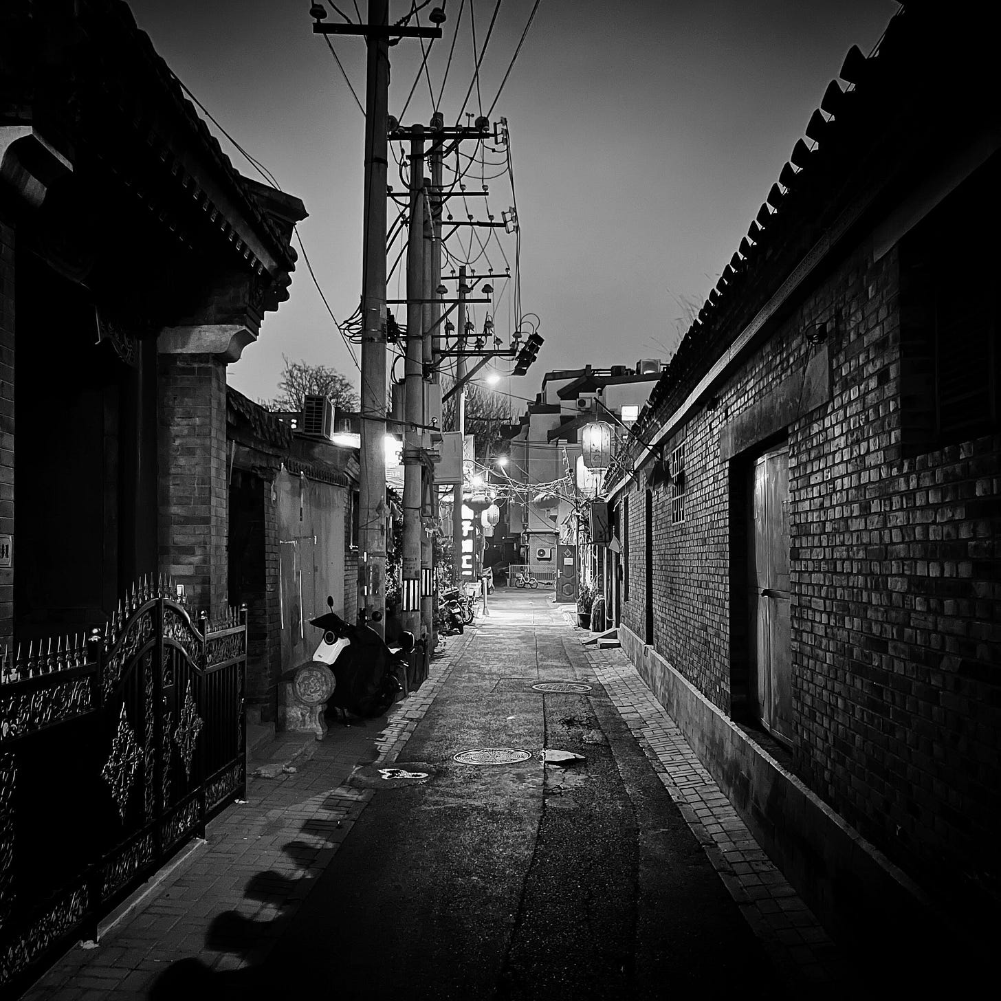 Nighttime in a historic hutong in central Beijing.