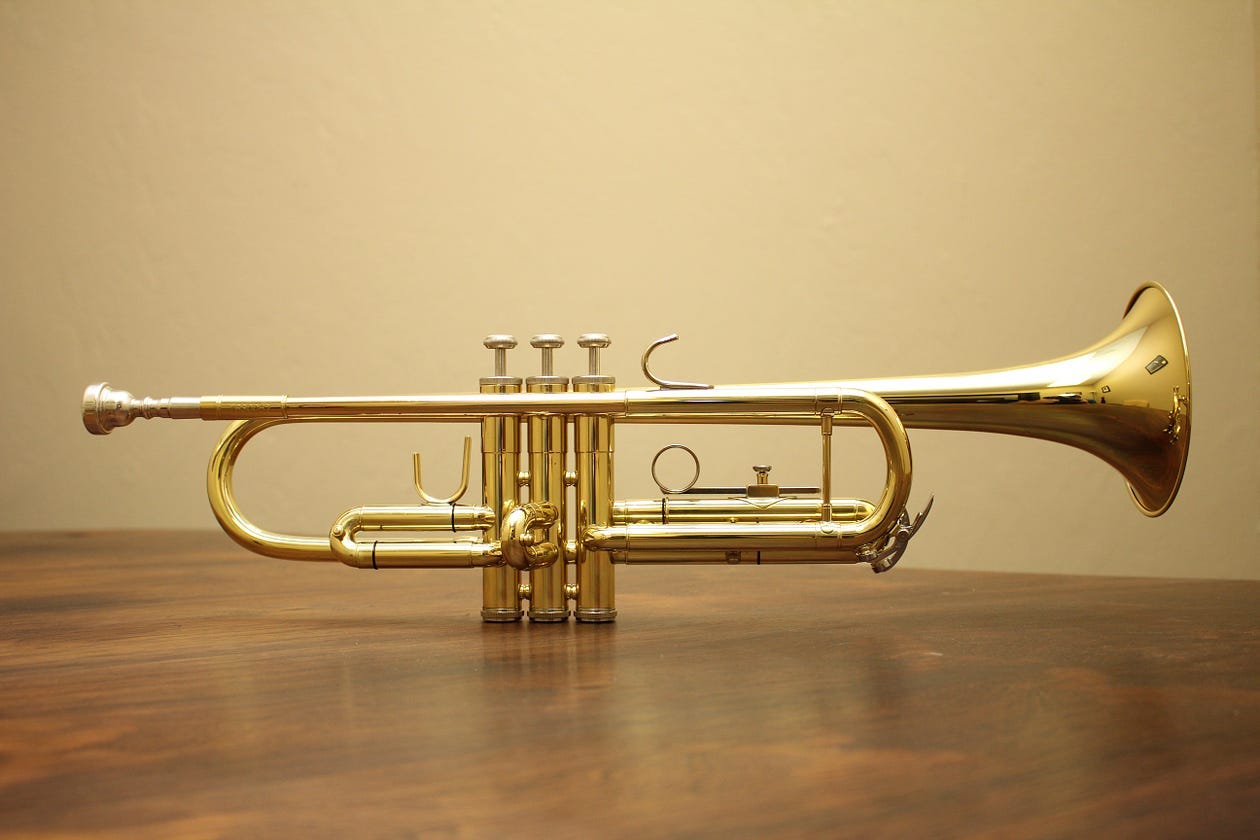 a trumpet on a table a trumpet on a table