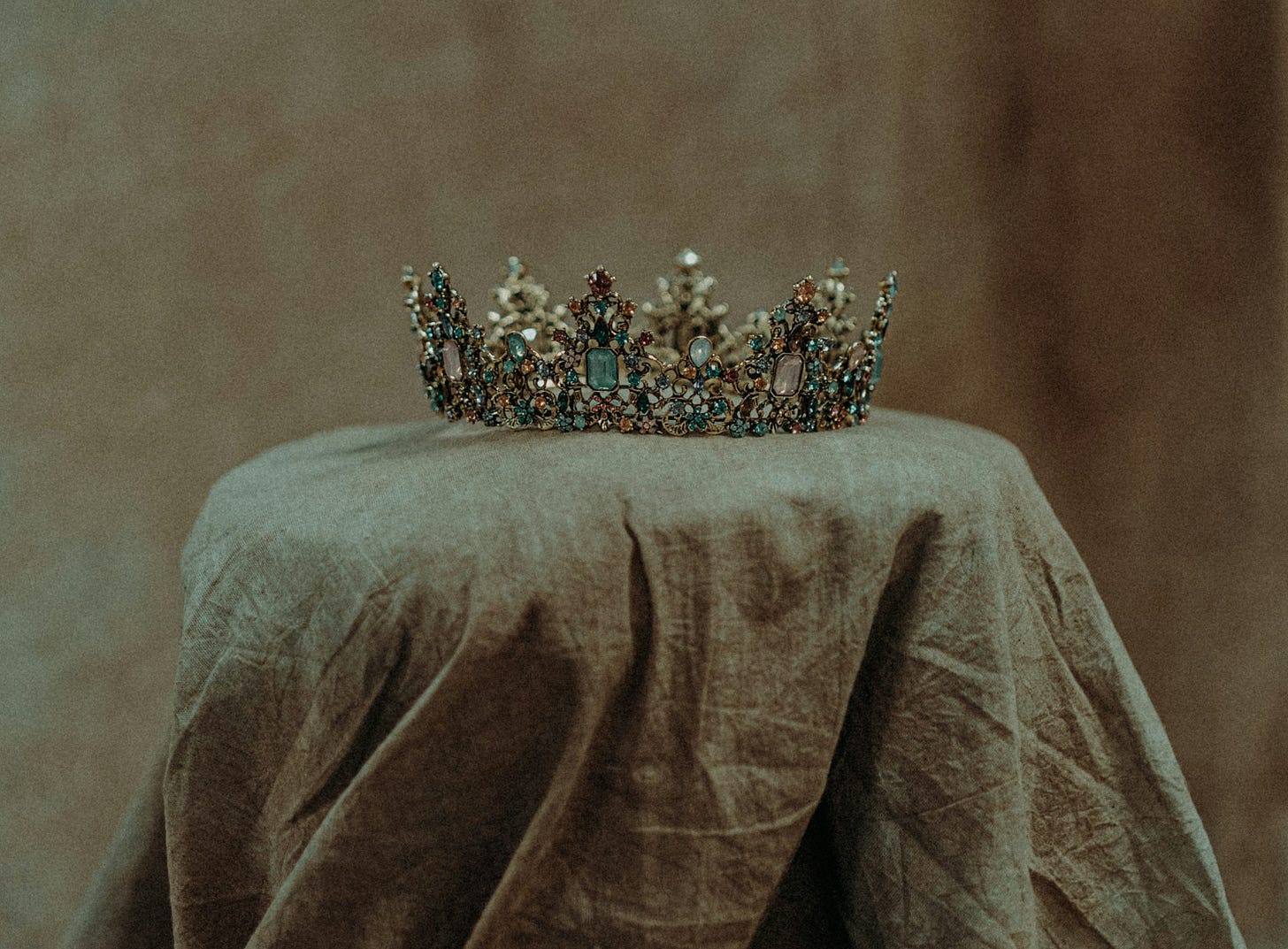 white and yellow flowers on brown textile white and yellow flowers on brown textile